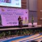 Potret sambutan Dekan Fakultas Ekonomi dan Bisnis pada saat sambutan ramah tamah IKA, (Foto: Nur Syakika.)