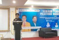 Sambutan oleh Ketua Panitia Seminar Pendidikan dan Pelatihan Bahasa Isyarat, (Foto: Muhammad Nasruddin.)