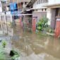 Banjir di jalan Muhajirin 1, (Foto: Rahmat Hidayat.)