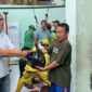 Suasana pembagian daging kurban, (Foto: Int.)