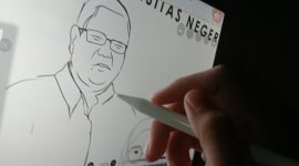 Potret seseorang menggambar karikatur, (Foto: Ist.)