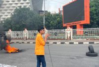 Potret Fuad dalam Menyampaikan Orasinya (Foto: Wina Pratiwi Agus Tina)