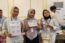 Potret Tiga Mahasiswi PKh FIP kenalkan inovasi Alat Baca Kata Berbasis Barcode, (Foto: Nur Syakika)