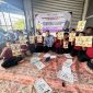 Potret Saat Pemberian Program Pengabdian Kepada Anak Pekerja Migran Indonesia (PMI) di Malaysia. (Foto: Ist.)